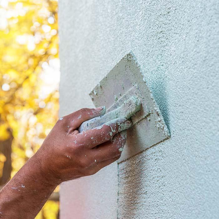 Plastering an exterior wall